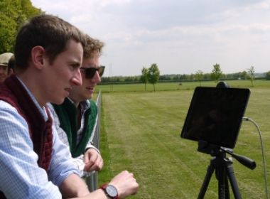 Students looking at tablet