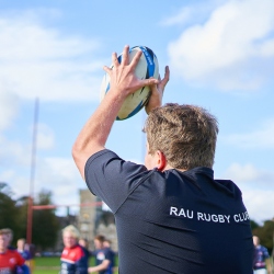 RAU rugby player catching ball