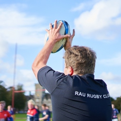 RAU rugby player catching ball