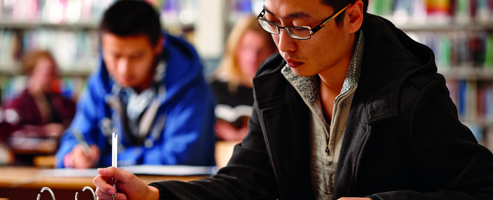 Students working in library