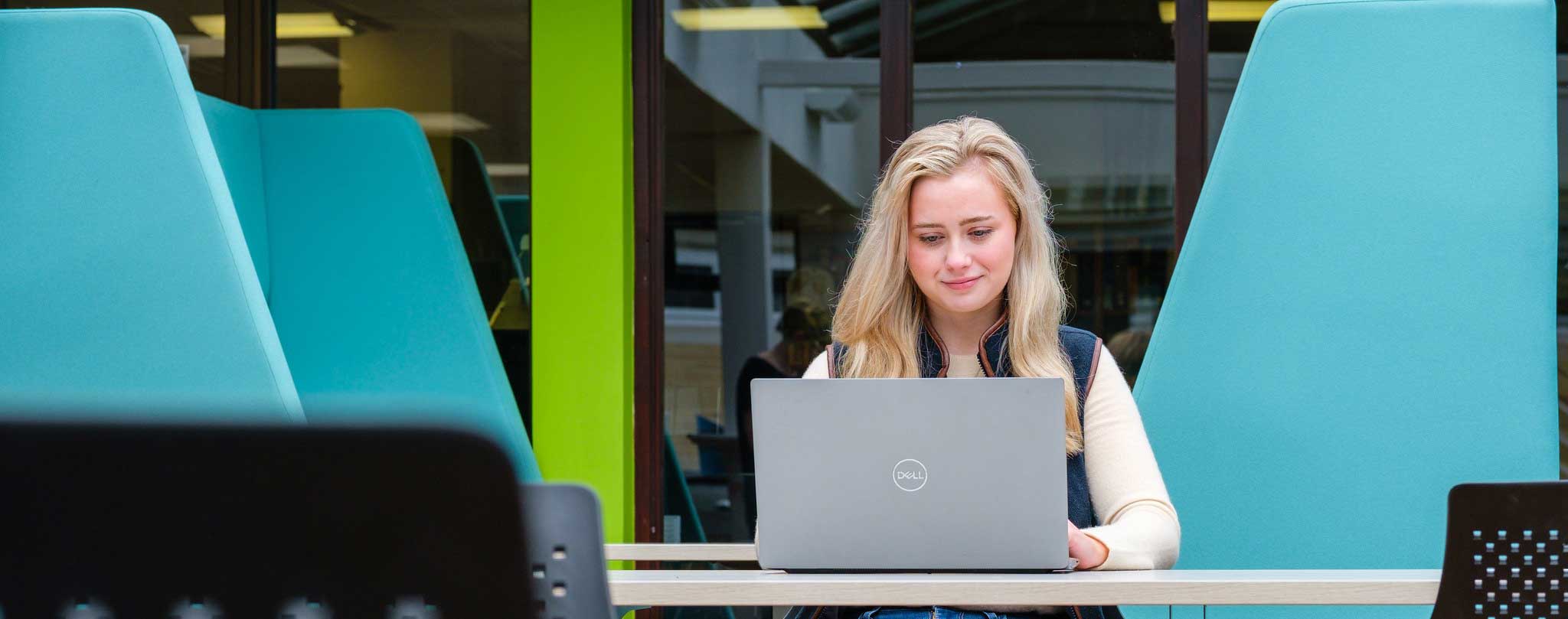 Student looking at laptop