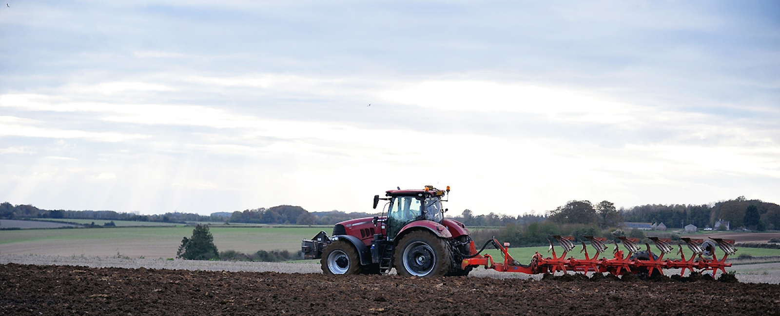 Tractor ploughing field