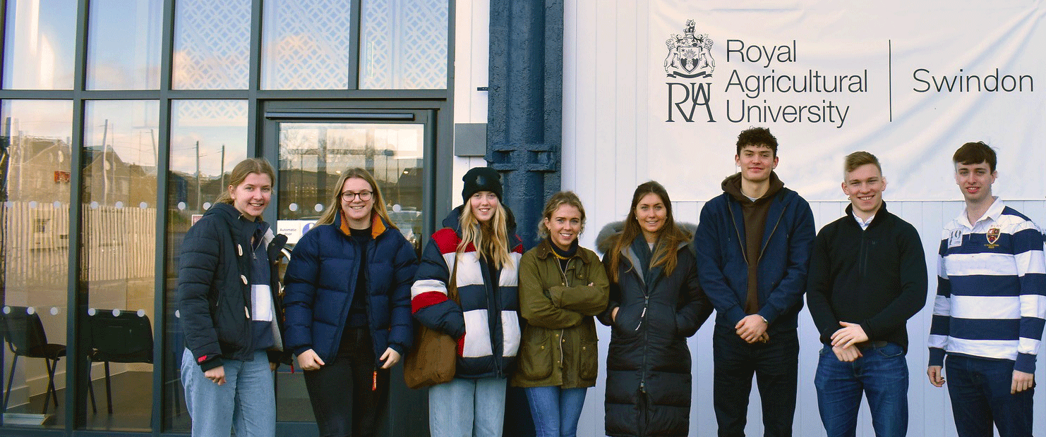 Group of students standing outside rau swindon building