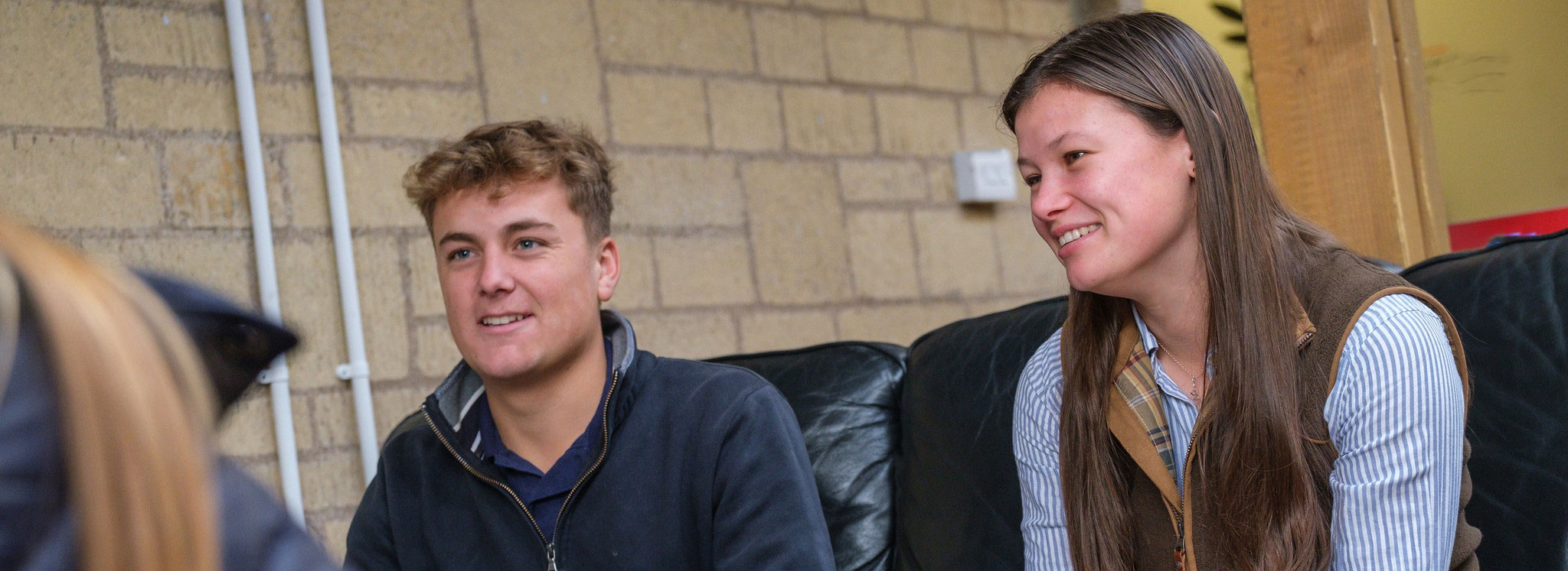 Three students chatting