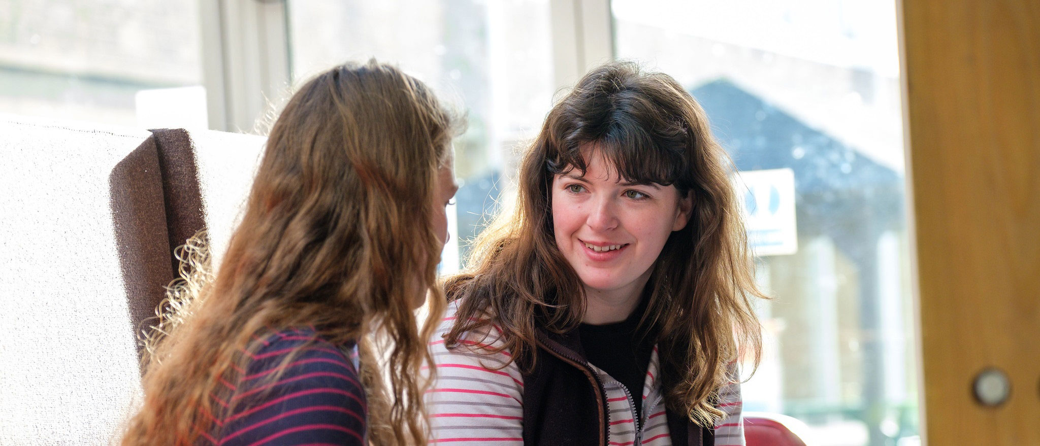 two female student chatting