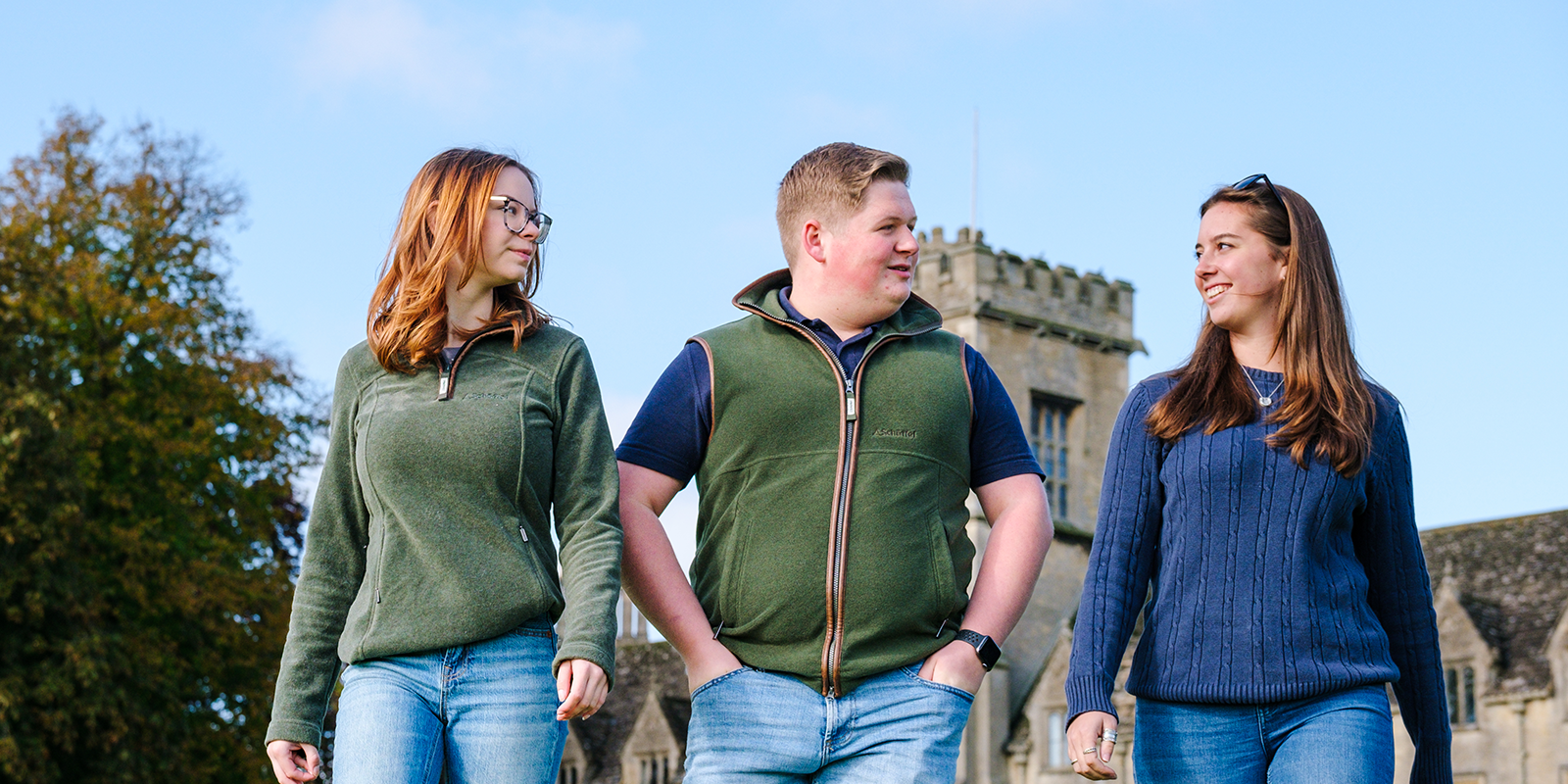 Three students walking 