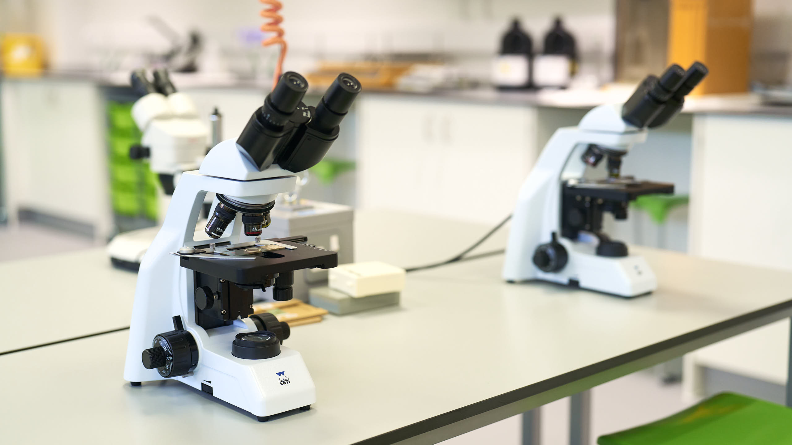 microscopes on a work bench