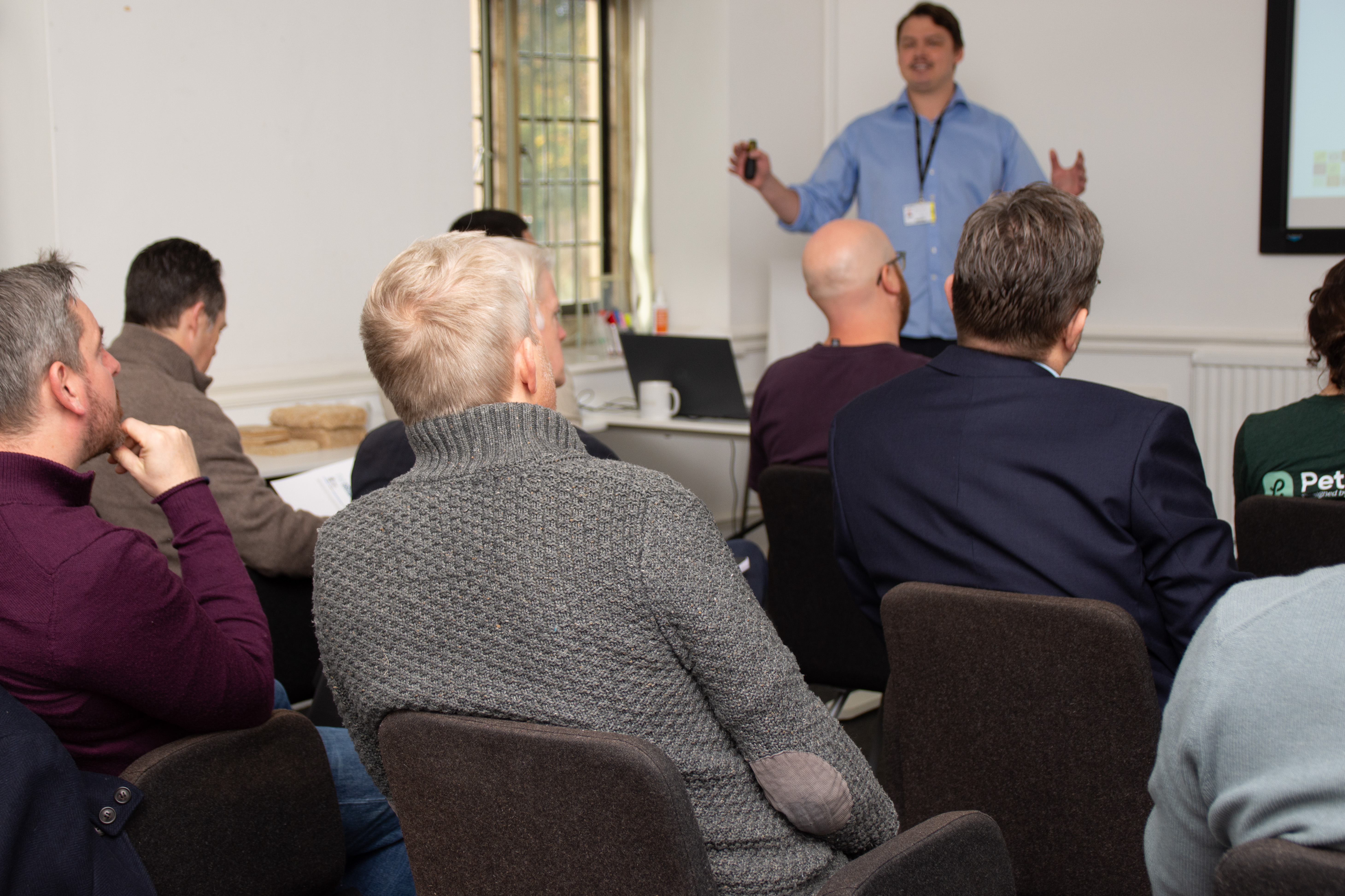 person speaking in front of an audience