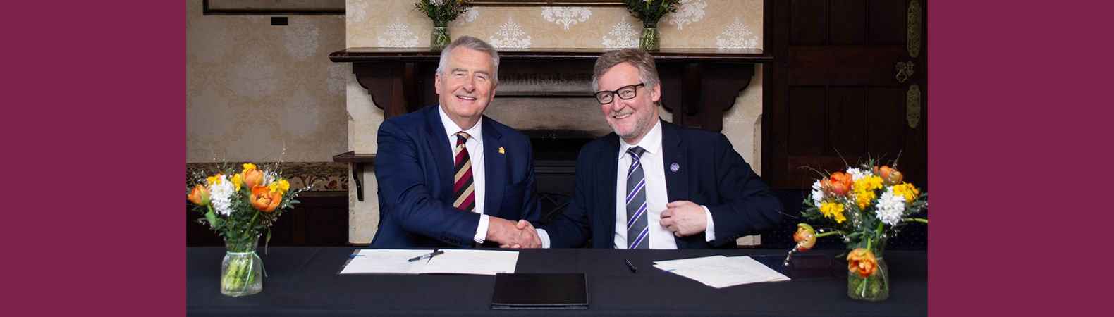Professor Peter McCaffery and Professor Stuart Reid, signing a memorandum of understanding