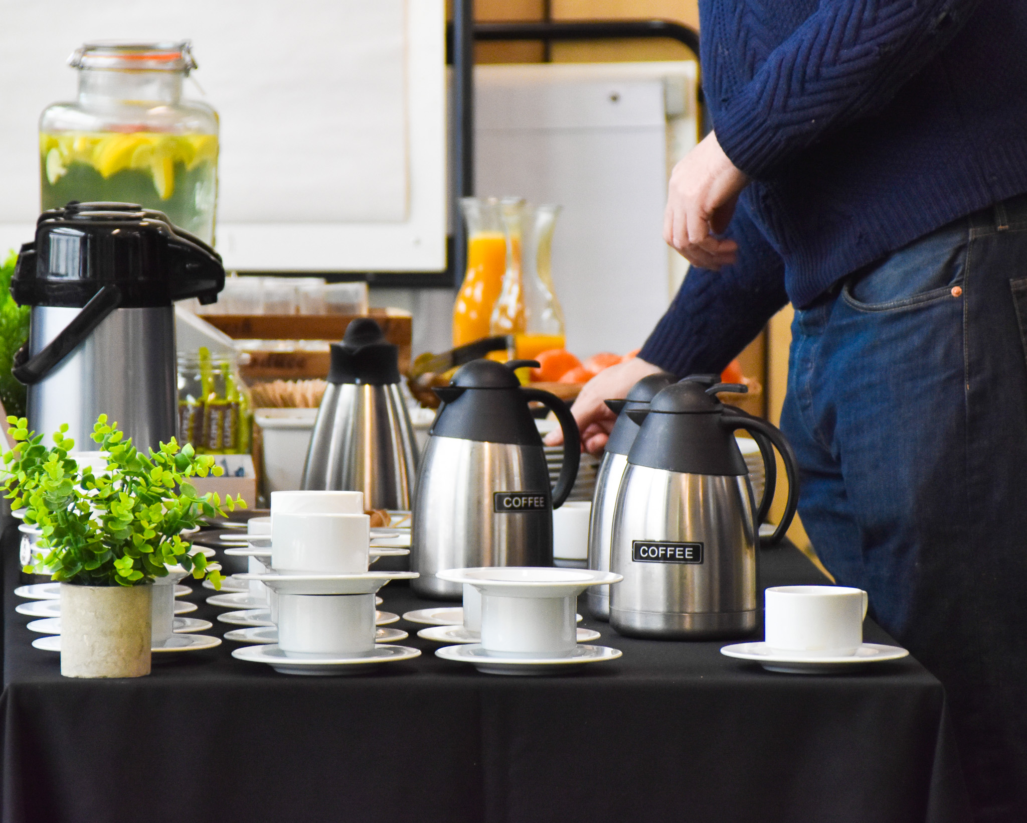 Person serving coffee