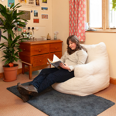 A student sat reading a book 