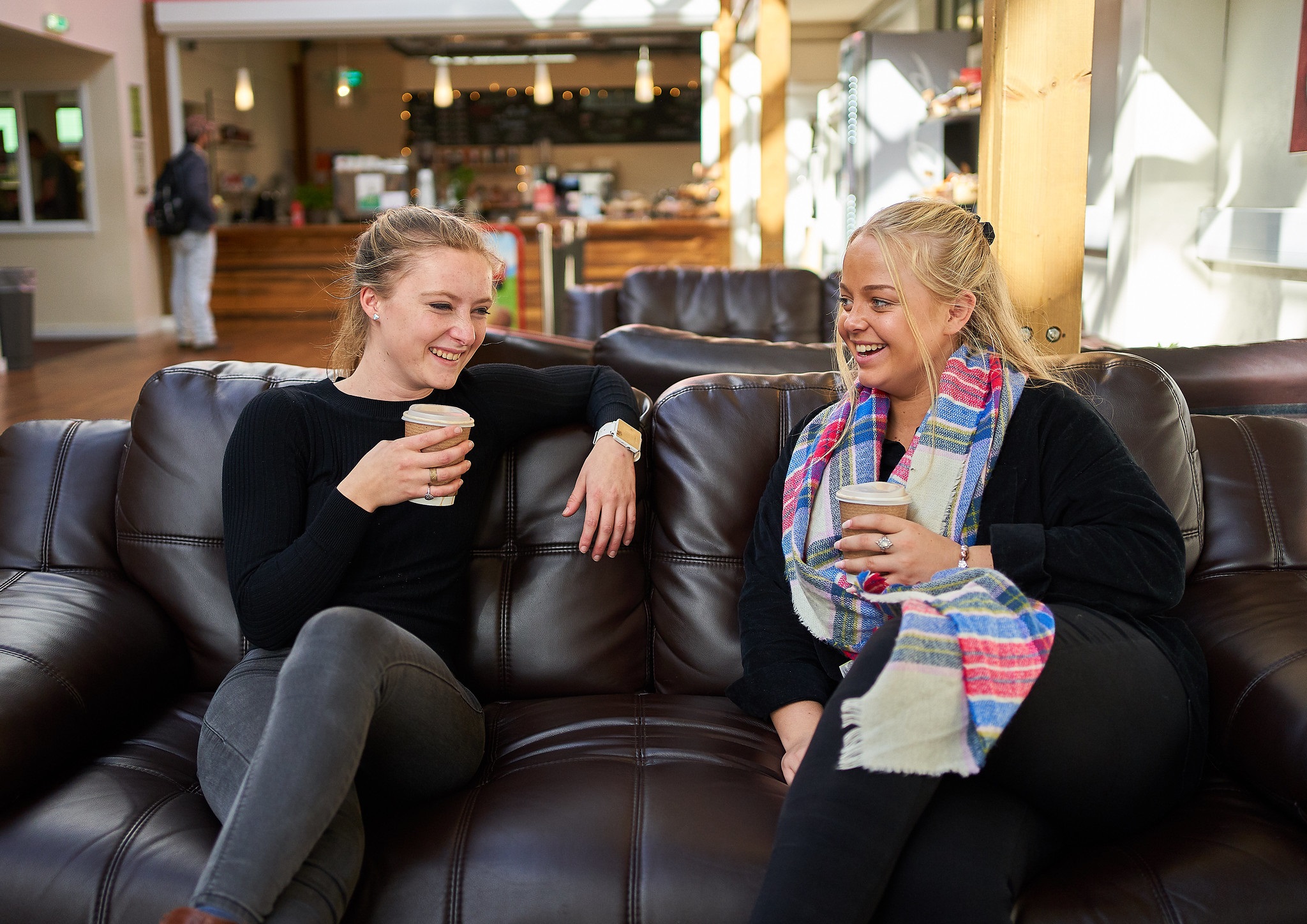 Students chatting over coffee