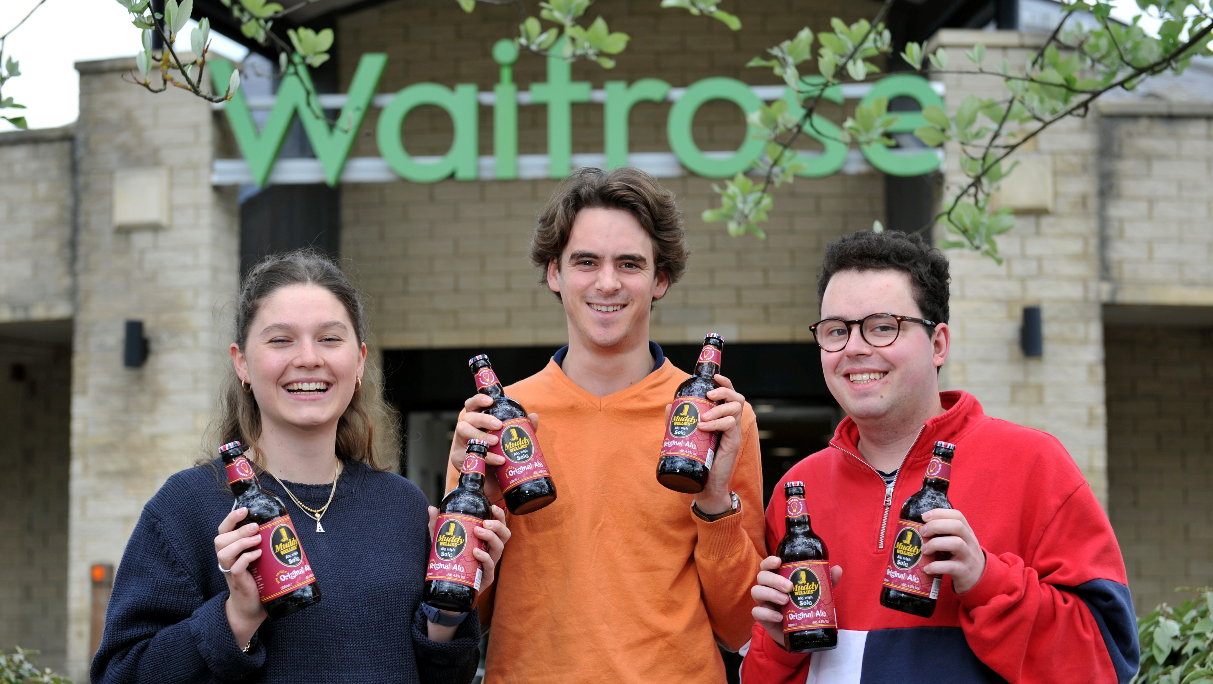 Student members of the Muddy Wellies social enterprise group (left to right) at Waitrose in Cirencester: Amelia Bailey, Charles de Fierlant Dormer and Ben Middlewood.