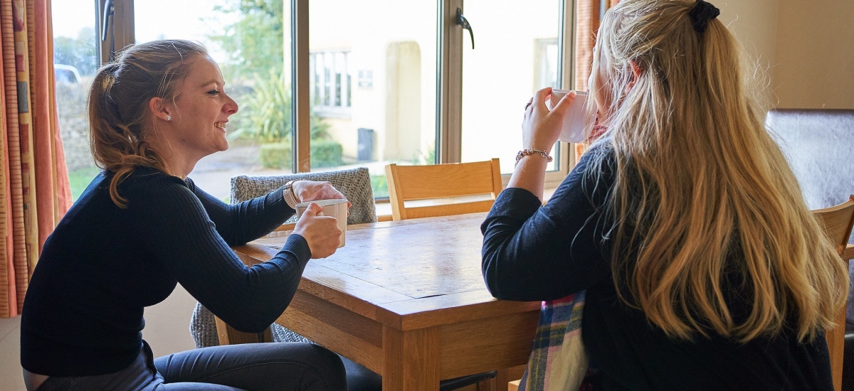 Girls sat at table
