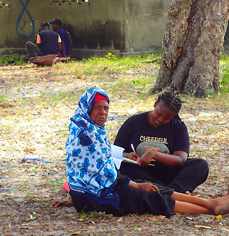 Neema interviewing a local woman