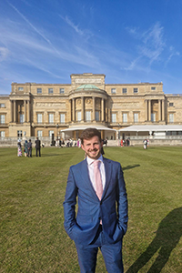 James Watson in grounds of Buckingham Palace