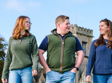 Three students walking 