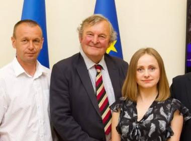 Professor Mark Horton and Olena Melnyk meeting associates in Ukraine